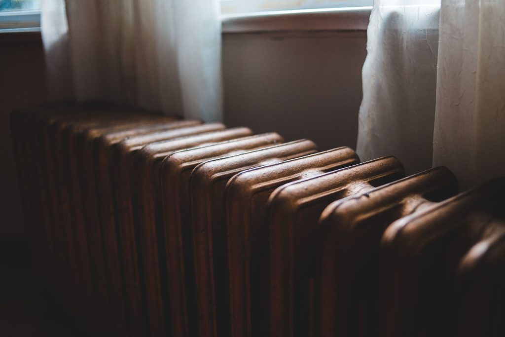 A traditional radiator system that may not be compatible with smart thermostats