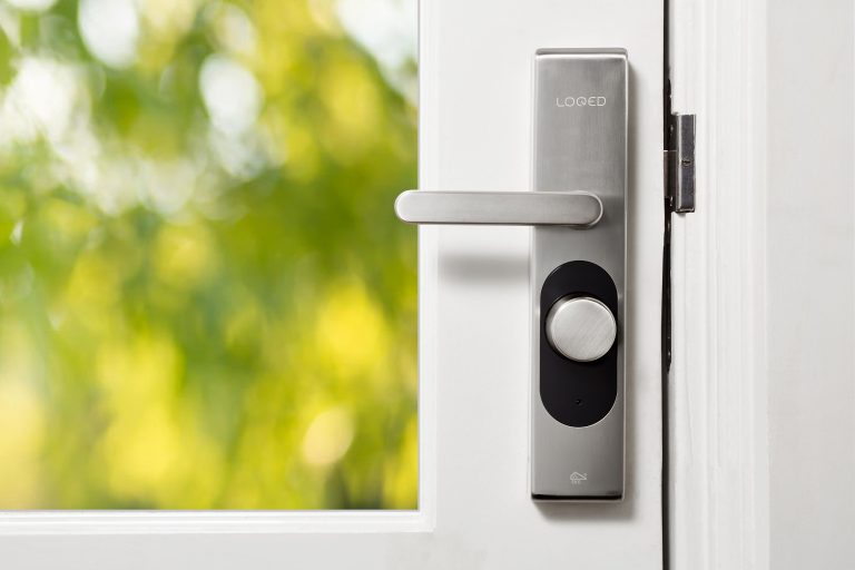 Are smart locks safe — a modern smart lock installed on a home door