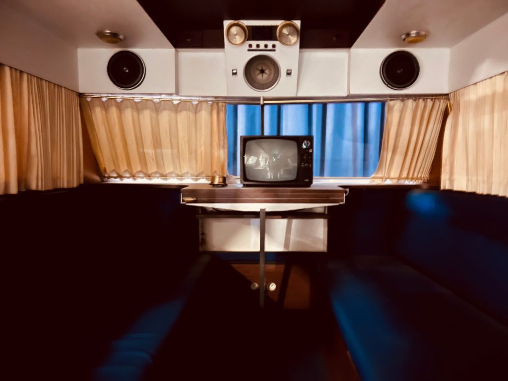 An entertainment setup with TV and audio devices that draw standby power when not in use