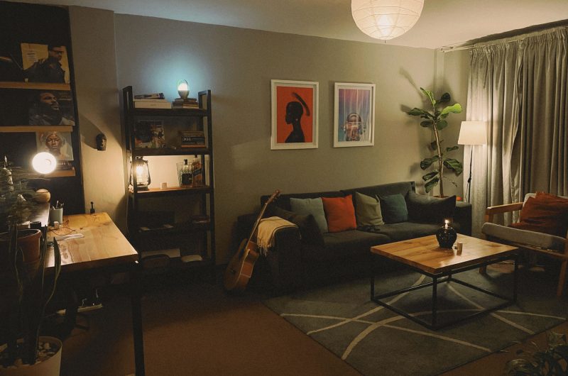 Smart home routines for beginners — a cozy living room with ambient lighting at night