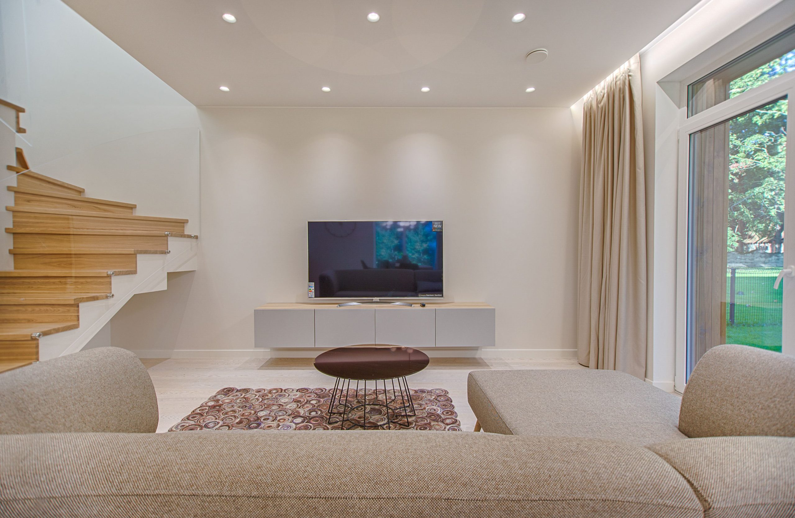 LED smart light strips used as shelf accent lighting in a living room