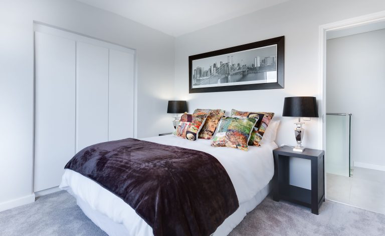 Smart home morning routine - warm light in a bedroom at sunrise